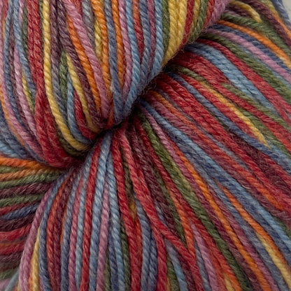 Multicolored skein of yarn on a white background