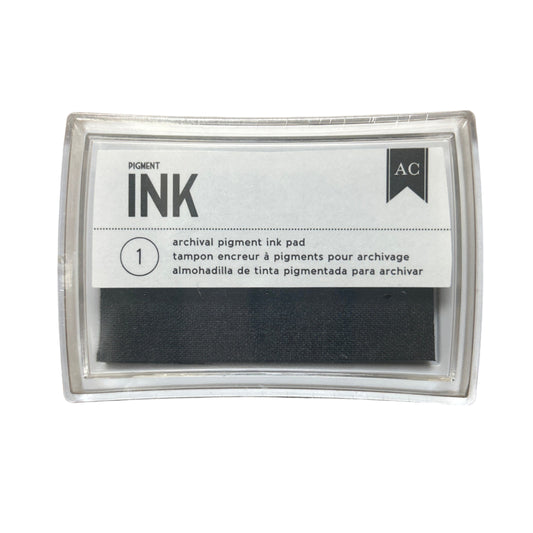 Ink pad with a label indicating it is an archival pigment ink pad, brand 'AC' visible.