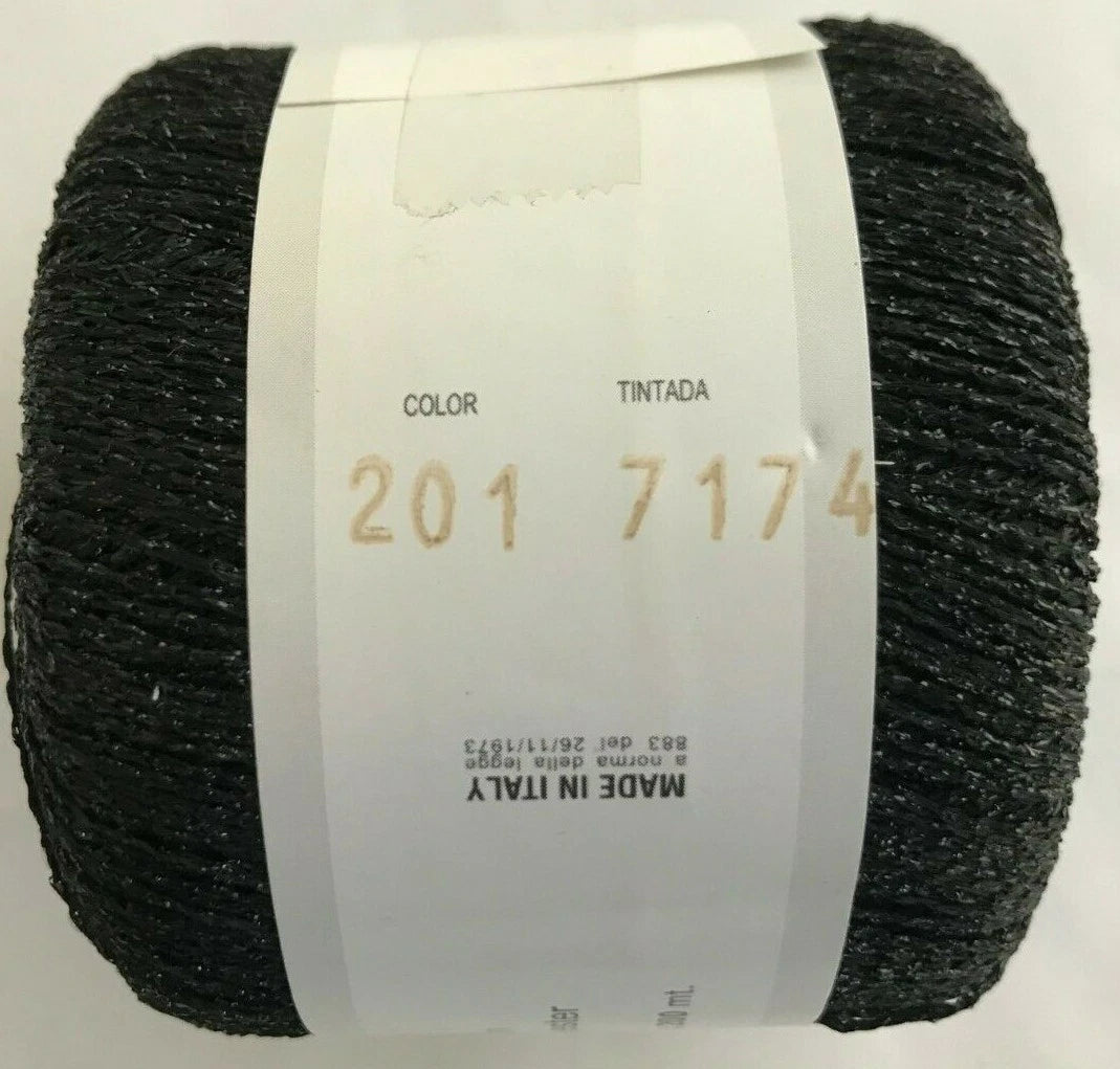 Ball of black yarn with a white label on a white background