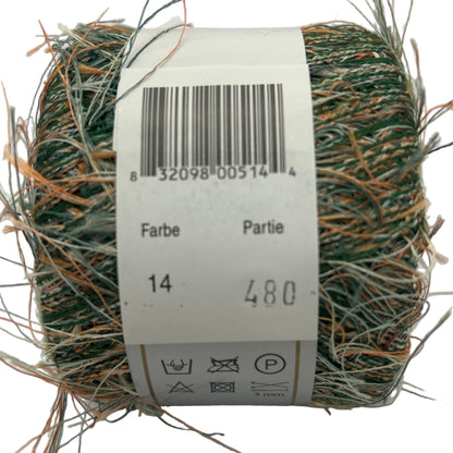 Ball of green yarn with a label on a white background