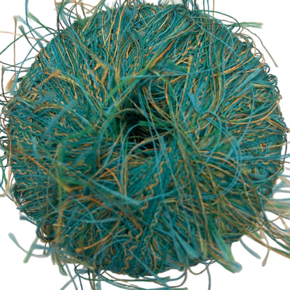 Ball of teal yarn on a white background