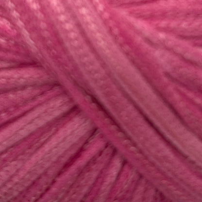 Close-up of pink yarn with a textured surface