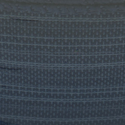 Close-up of a textured blue fabric with a subtle pattern