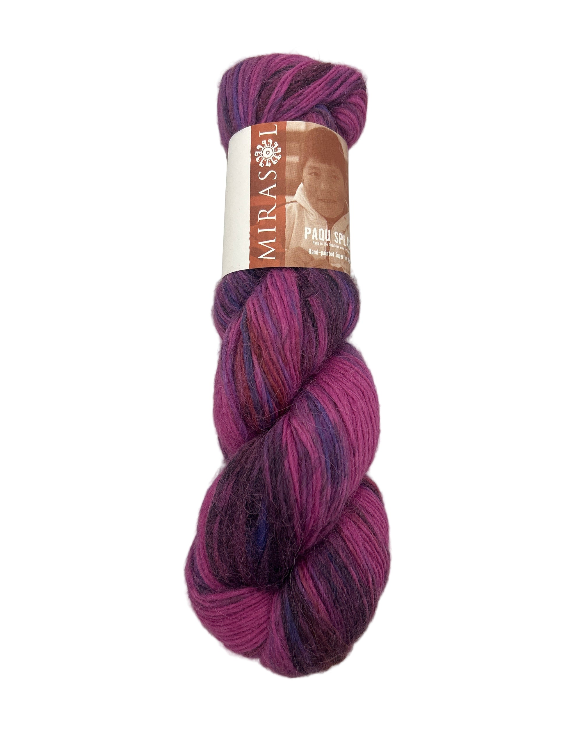 Purple skein of yarn with a label on a light gray background