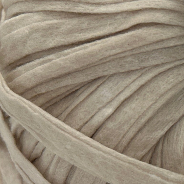 Close-up of a ball of beige yarn