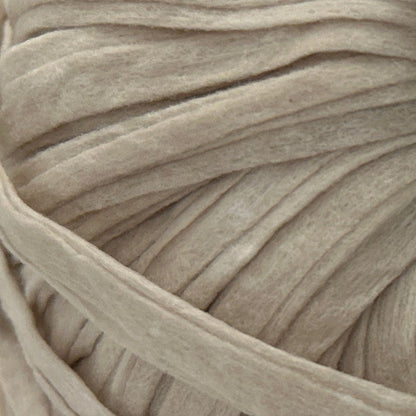 Close-up of a ball of beige yarn