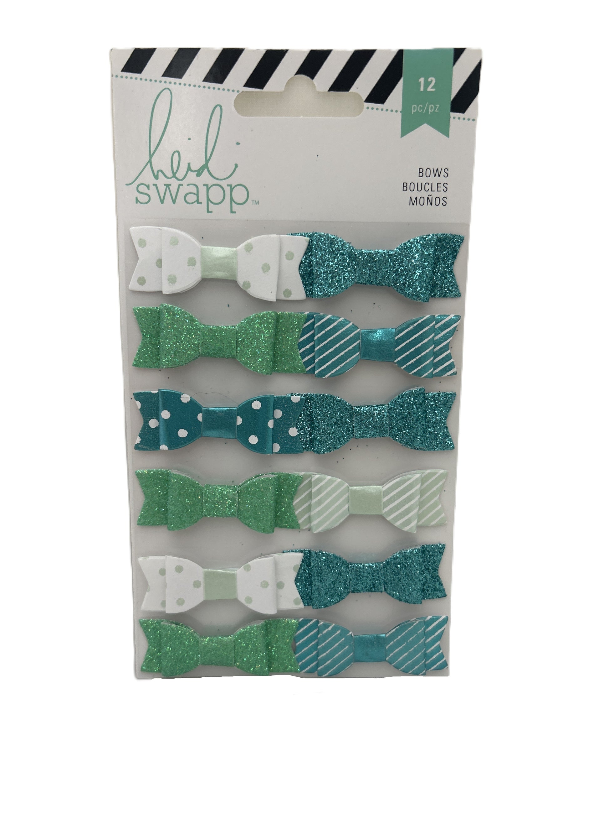 Packaged set of decorative bows with various patterns on a white background