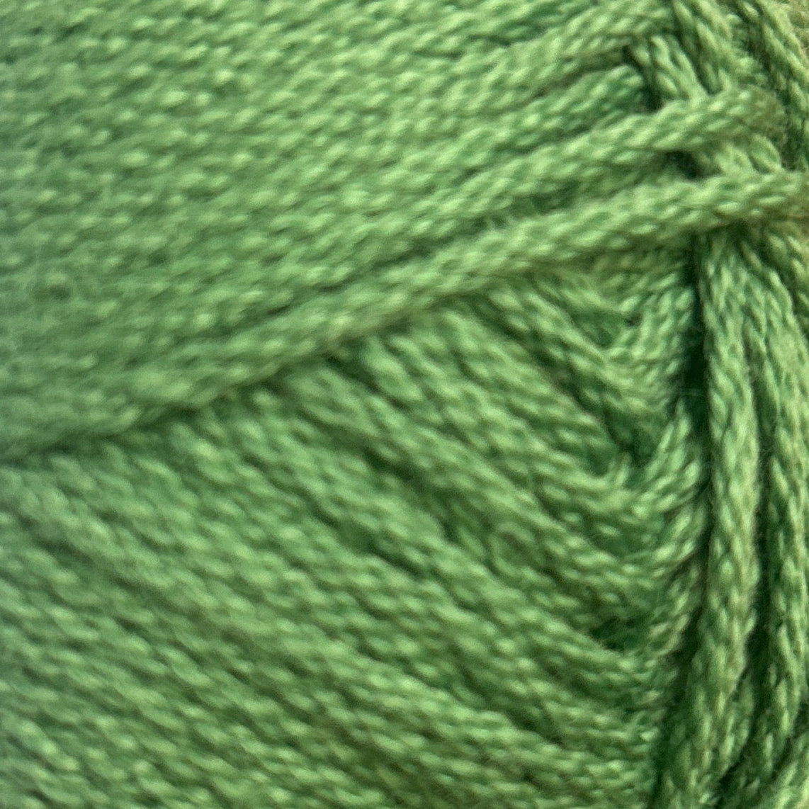 Close-up of green yarn ball