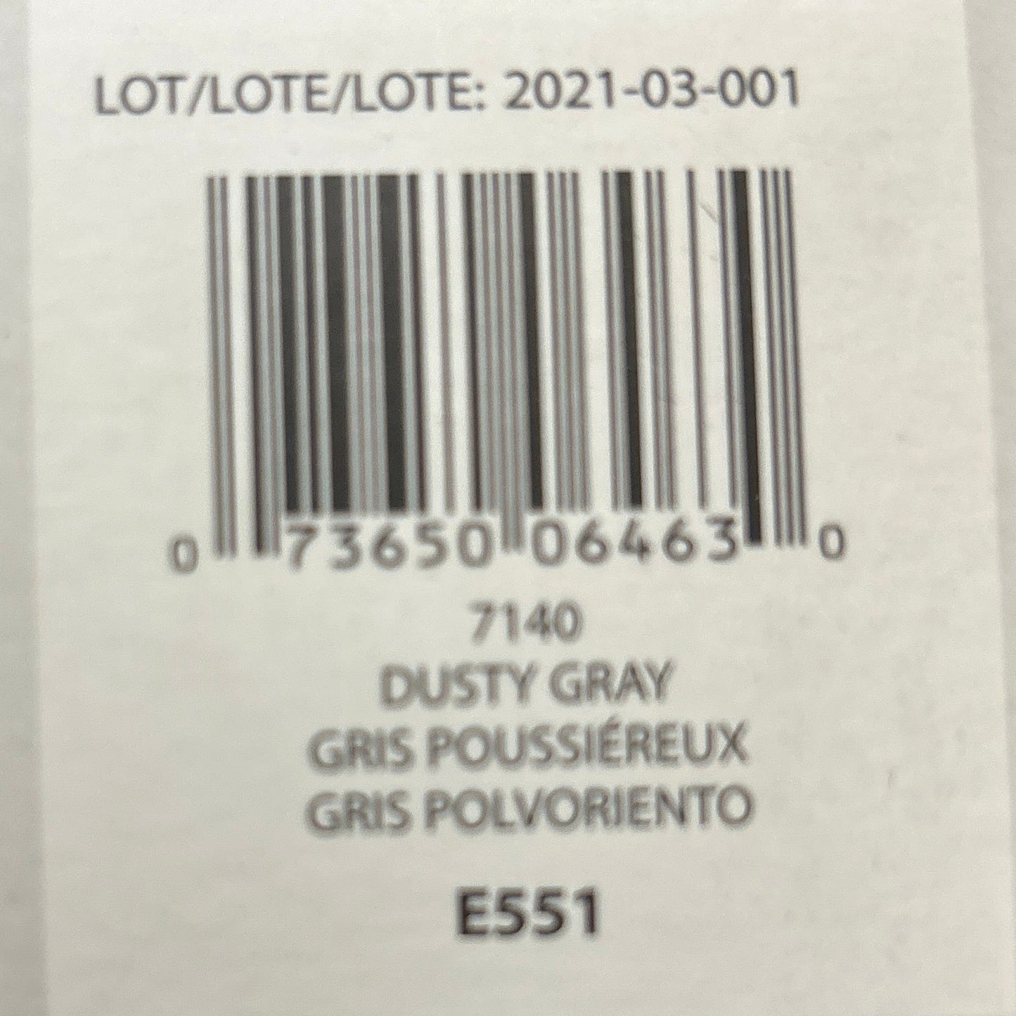 Product label with text and barcode on a wooden background