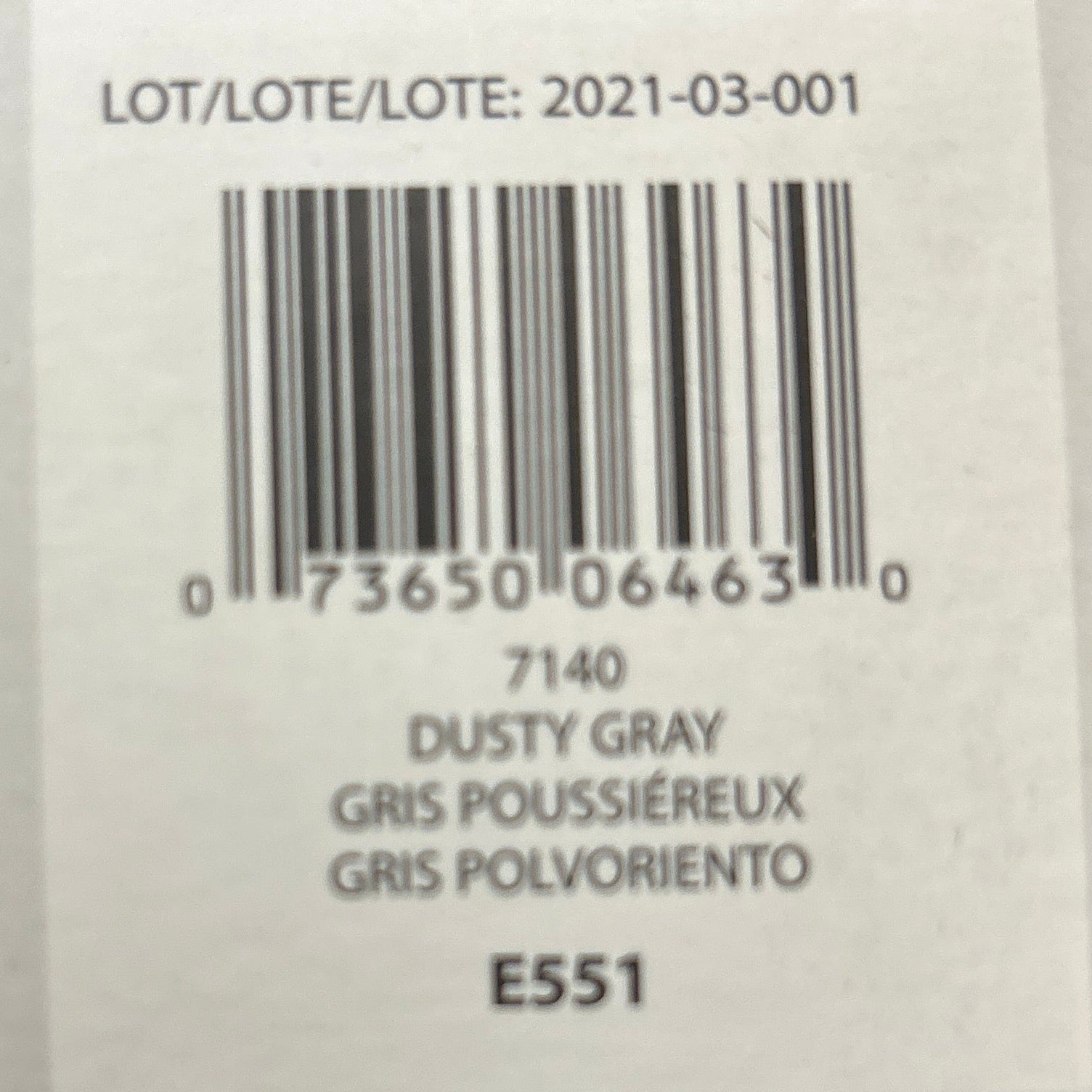 Product label with text and barcode on a wooden background
