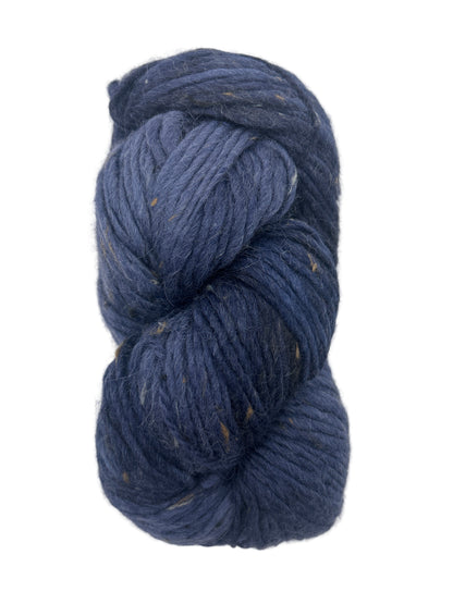 Blue skein of yarn on a white background