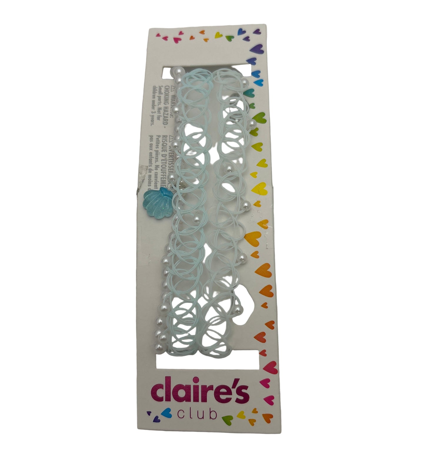 Decorative paper cutouts with colorful heart shapes in a Claire's Club packaging on a white background