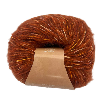 Ball of brown yarn with a label on a white background