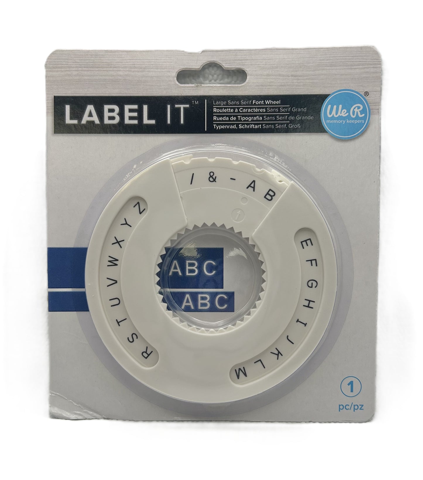 Labeling wheel with letter and number wheel in packaging on a white background