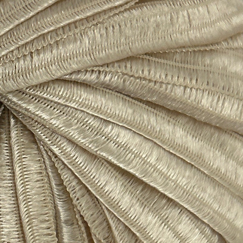 Close-up of beige textured fabric