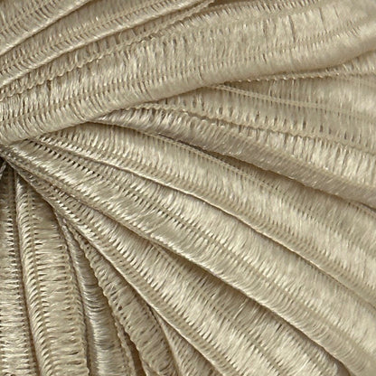 Close-up of beige textured fabric