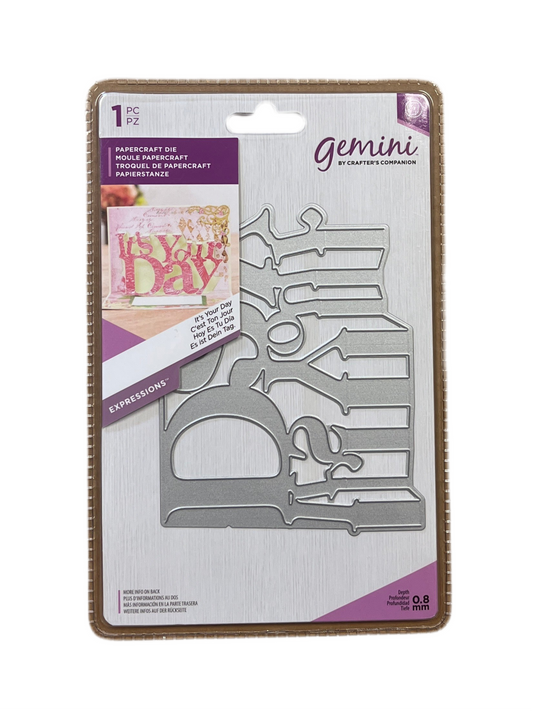 Packaging of Gemini paper craft die with cut-out shapes on a white background