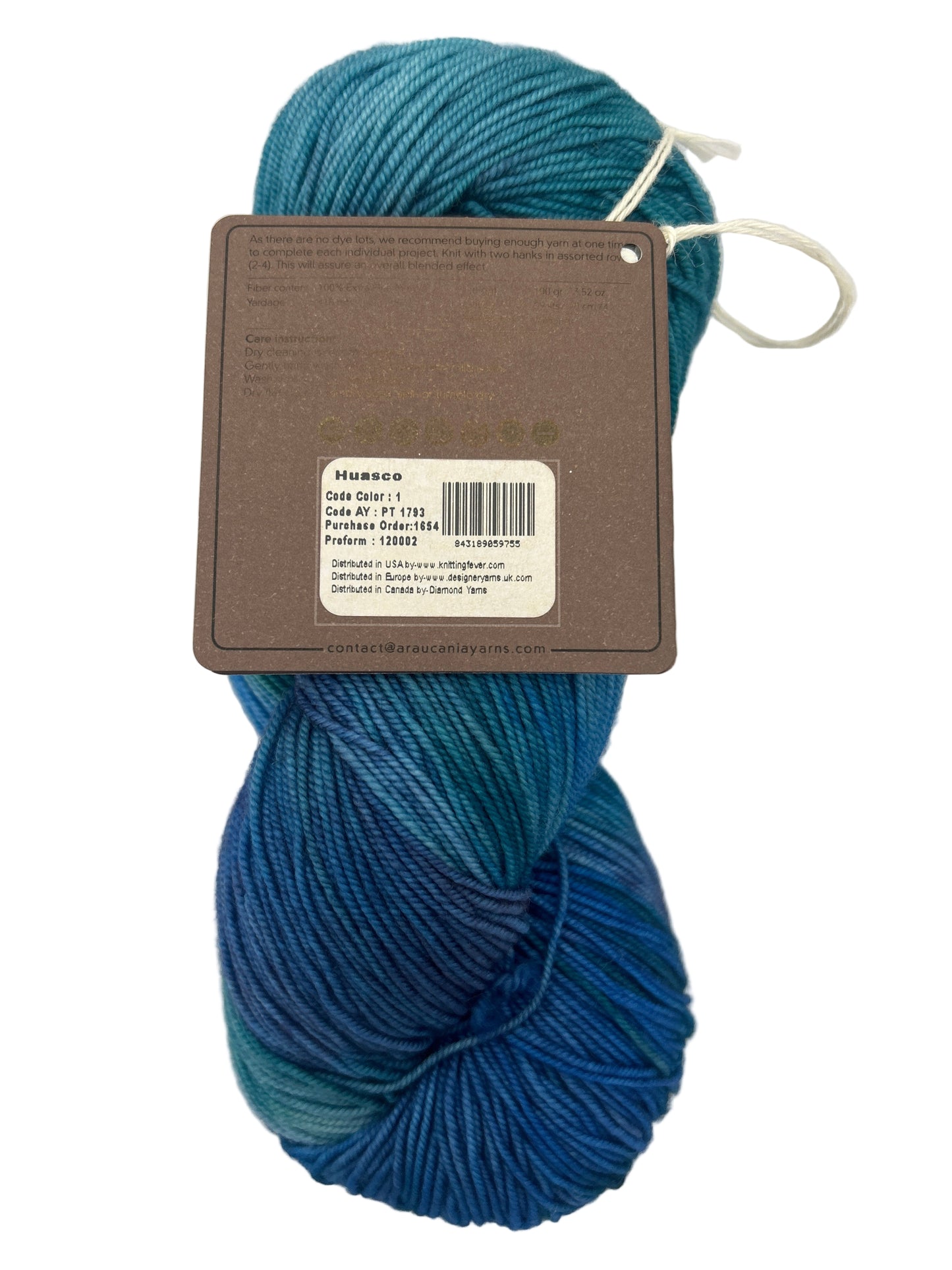Blue skein of yarn with a label on a white background