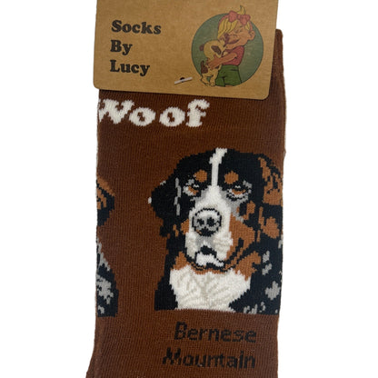 Brown sock with dog pattern and label on a textured surface