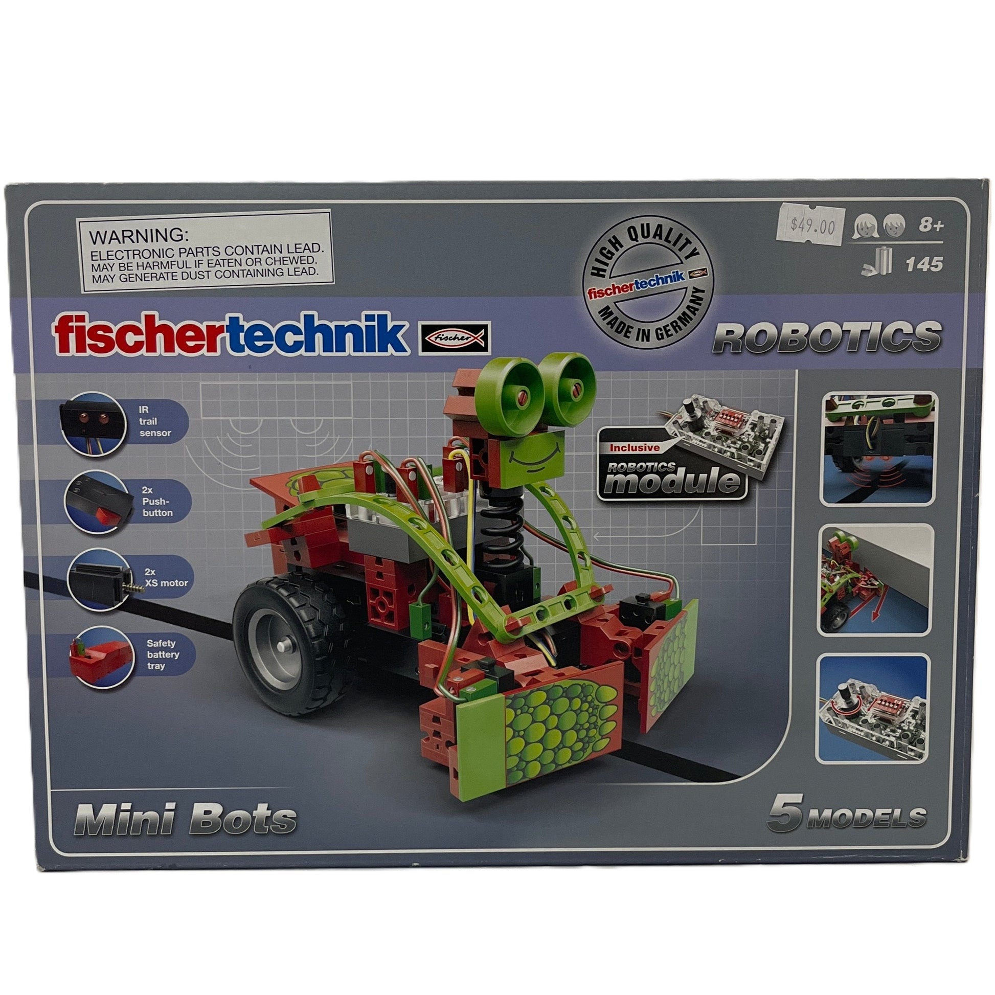 Fischertechnik robotics kit packaging with toy robot model on a gray background