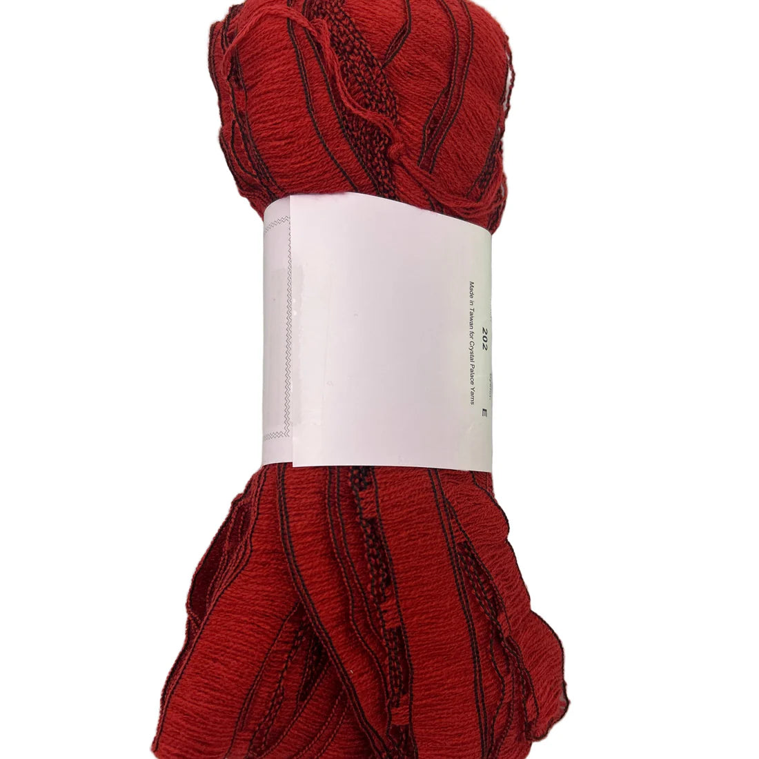 Red yarn skein with a white label on a white background