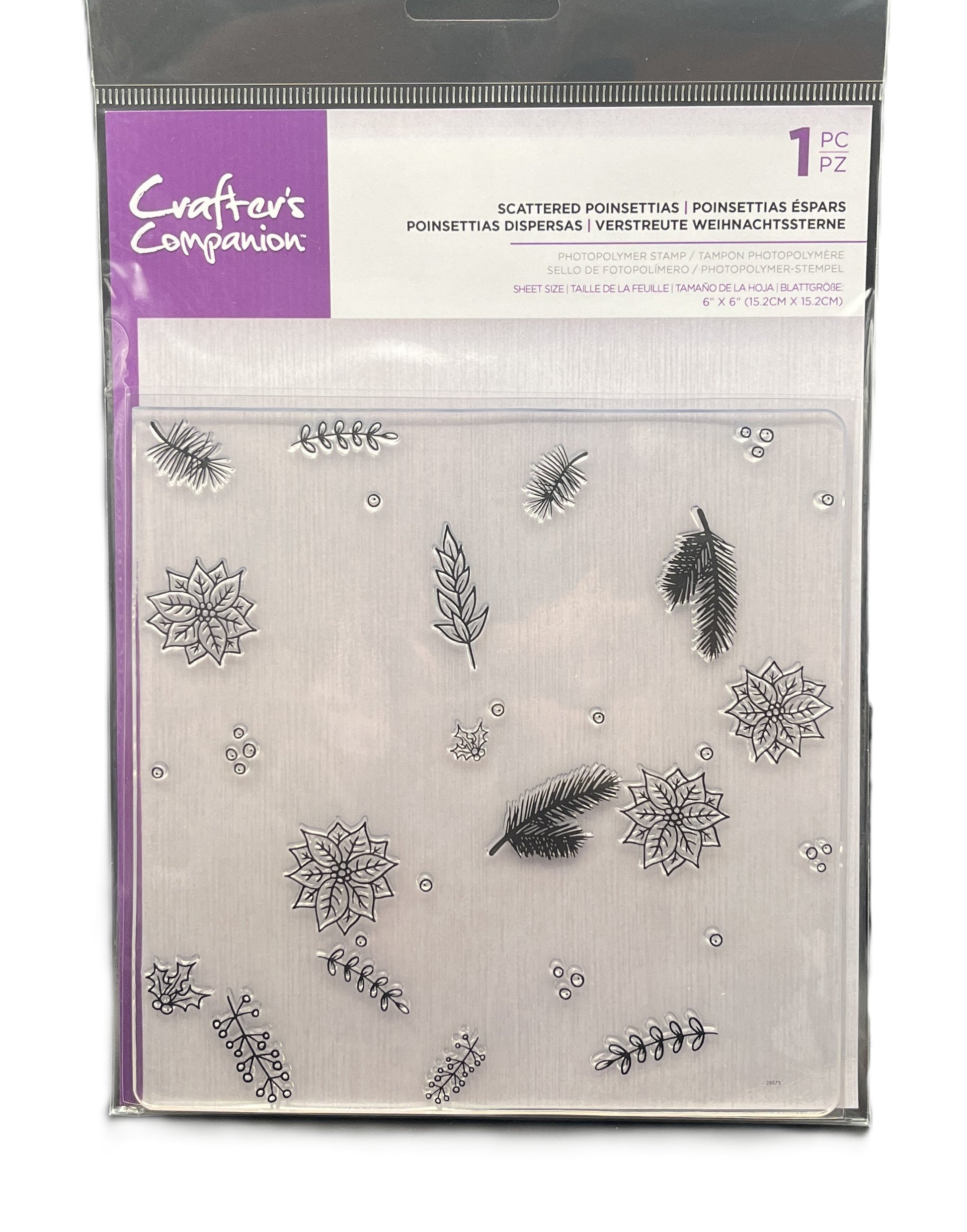 Packaged clear stamp set with winter-themed designs on a white background