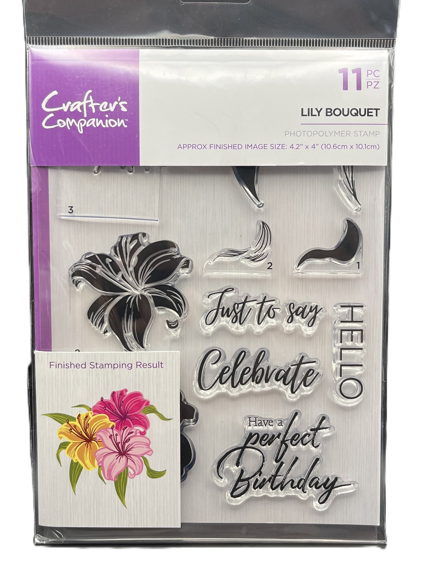 Packaged set of clear stamps with floral and text designs, brand 'Crafters Companion' visible.