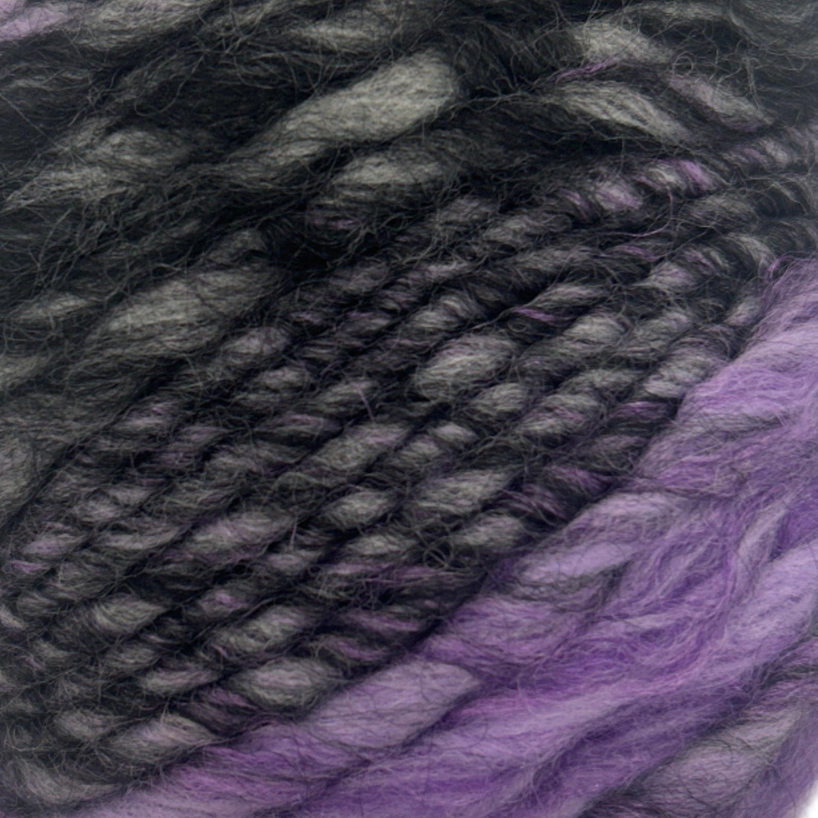 Ball of purple and gray yarn on a white background