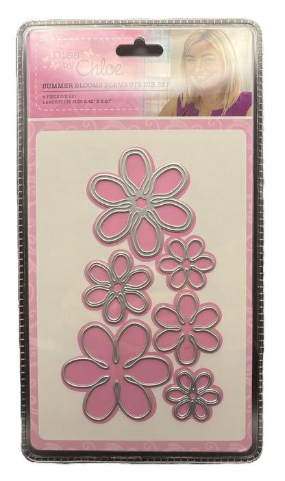 Metal die cutters with flower shapes on a pink packaging
