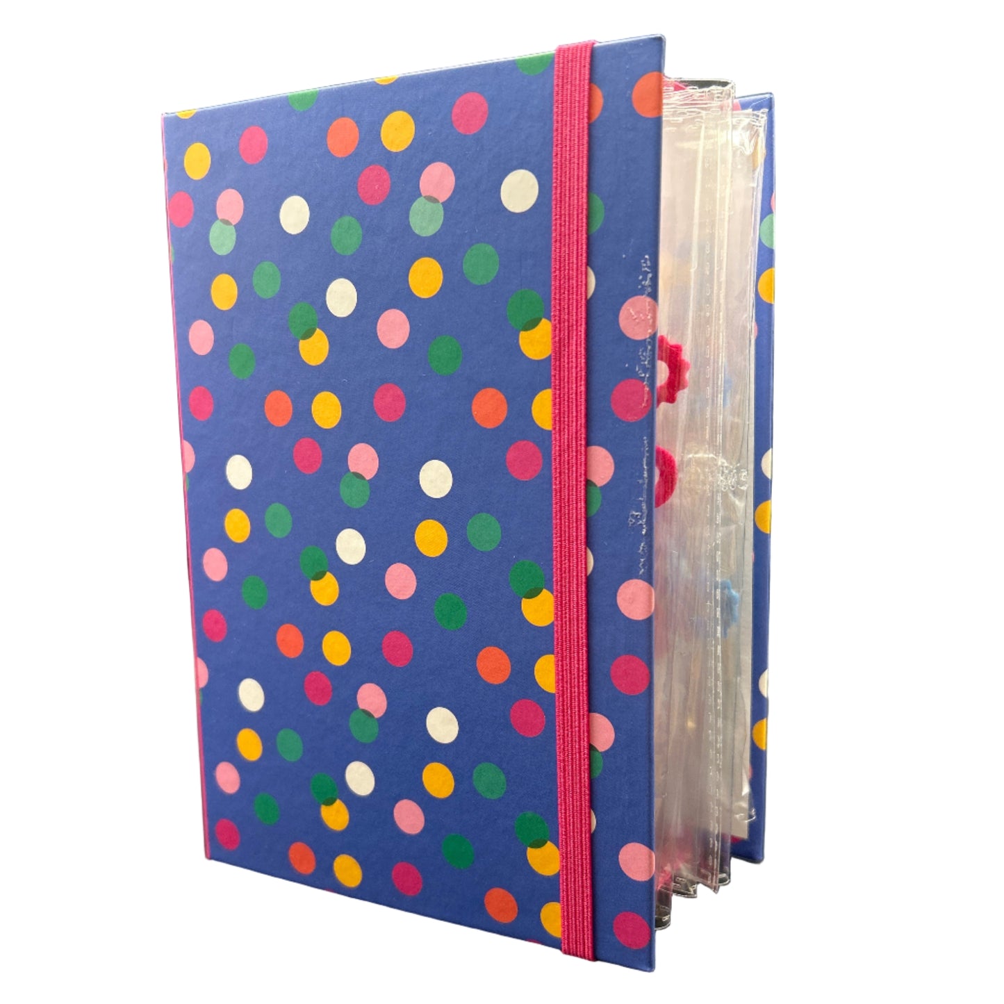 Polka dot file folder on a black surface