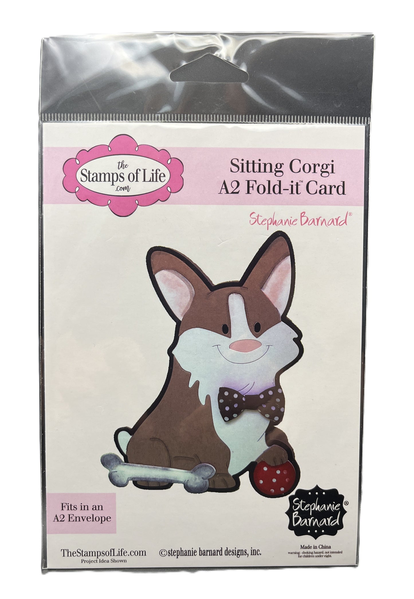 Card packaging with a corgi illustration and 'The Stamps of Life' branding.