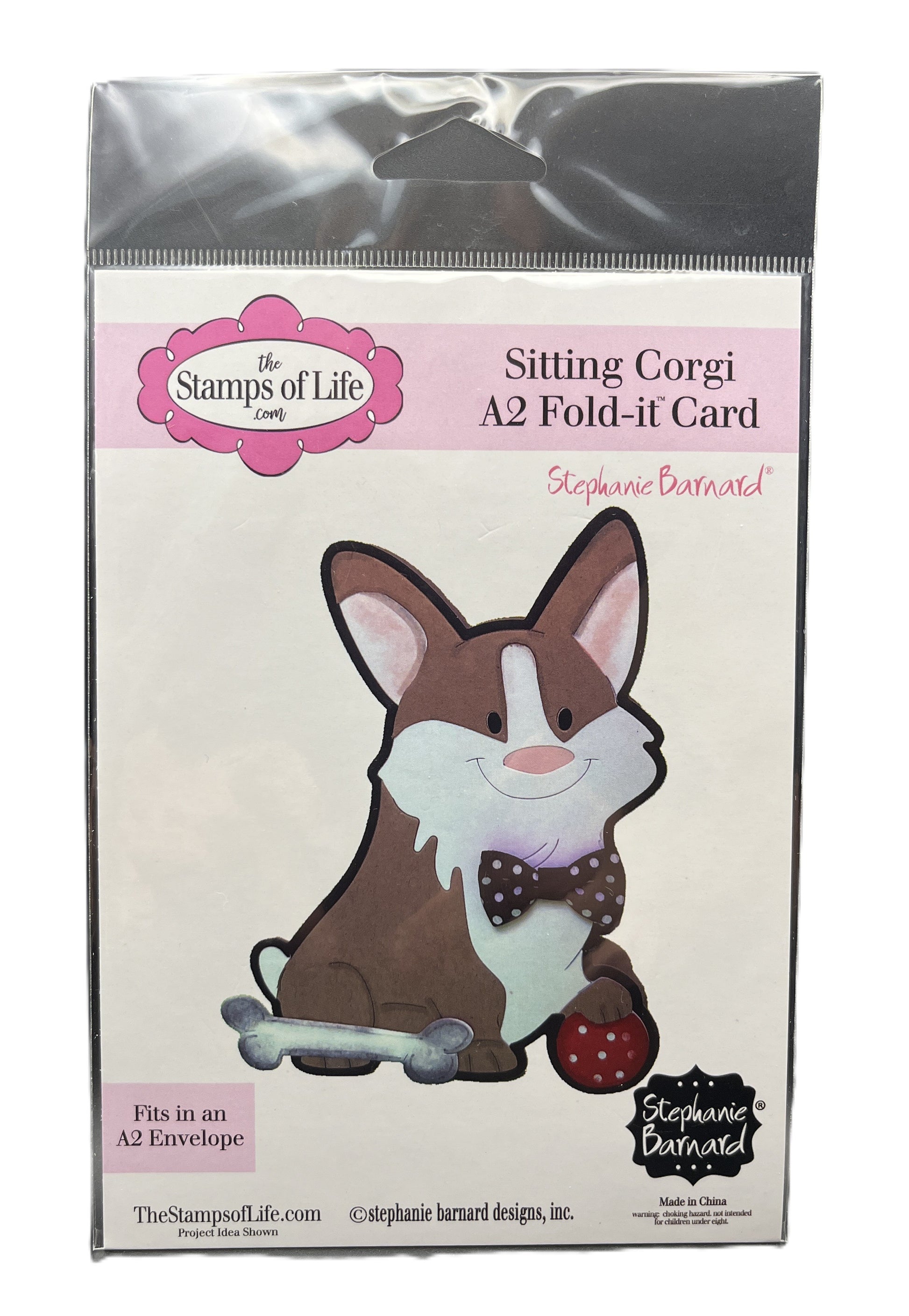 Card packaging with a corgi illustration and 'The Stamps of Life' branding.