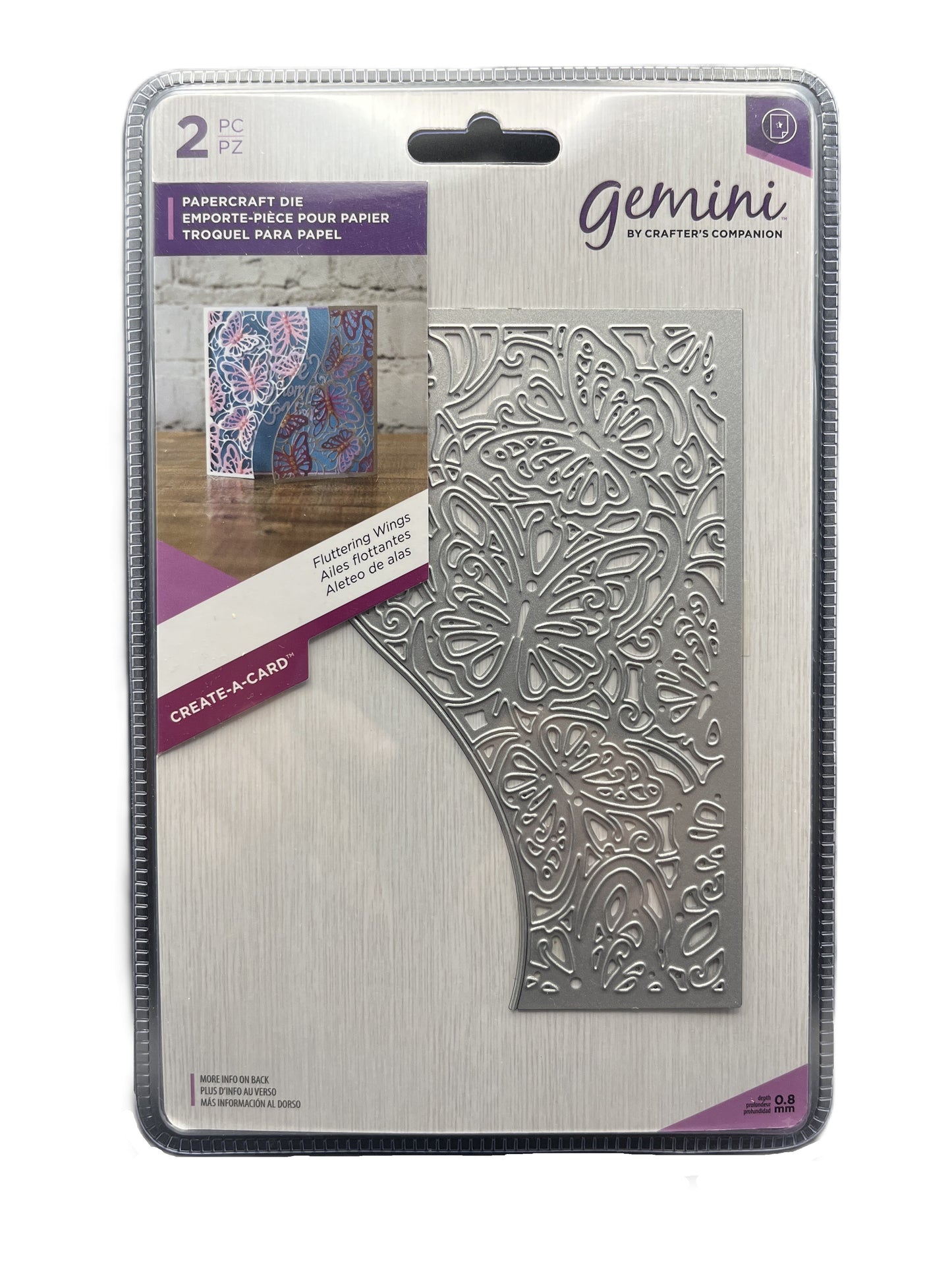 Metallic die with intricate design on a Gemini packaging