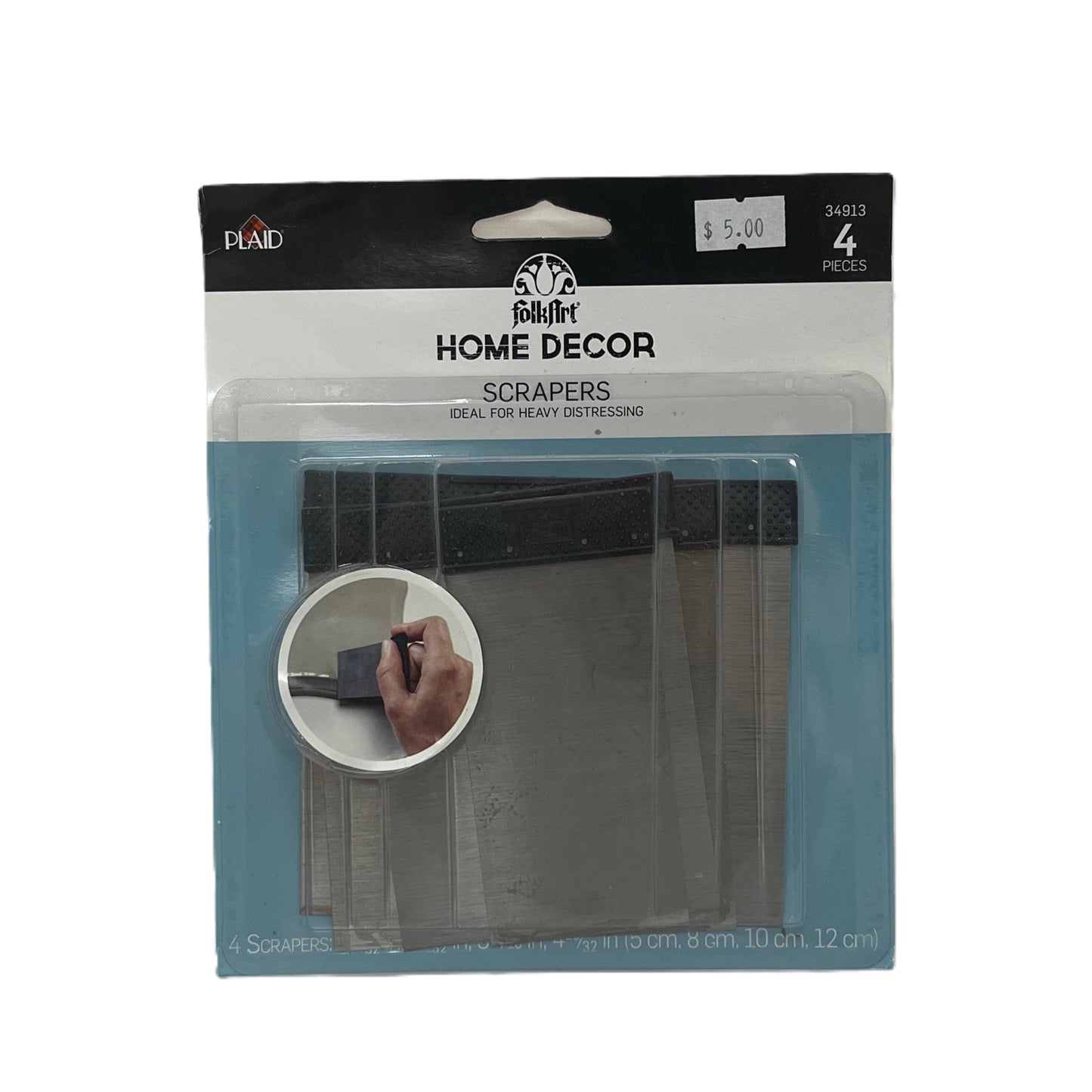 Package of home decor scrapers with a hand holding a scraper illustration on a white background