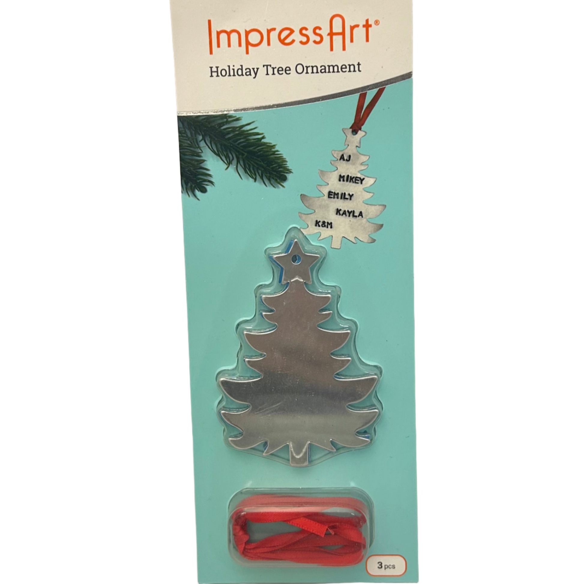 Packaged holiday tree ornament with names on a teal background