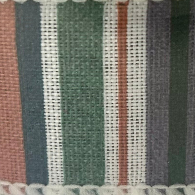 Close-up of woven fabric with horizontal stripes in various colors.
