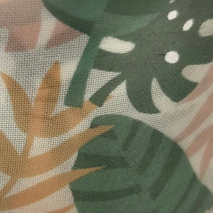 Close-up of fabric with green and brown leaf pattern