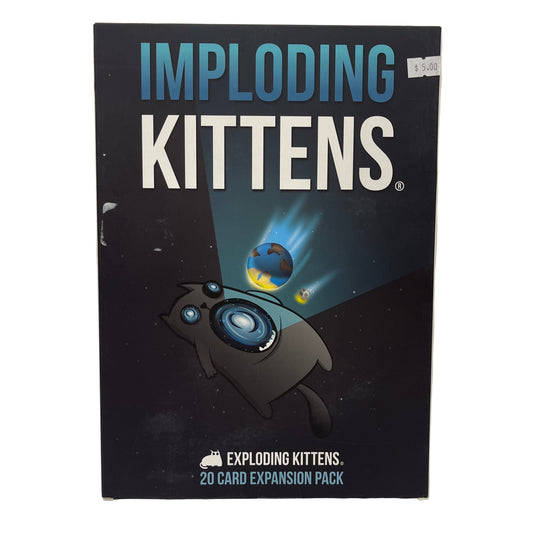 Card game expansion pack titled 'Imploding Kittens' with space-themed illustration on a black background.