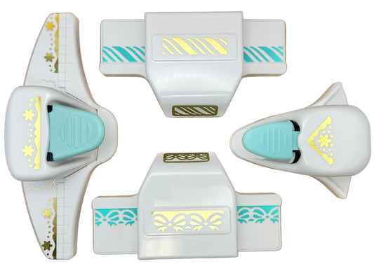 Set of white and turquoise cookie cutters with decorative patterns on a white background