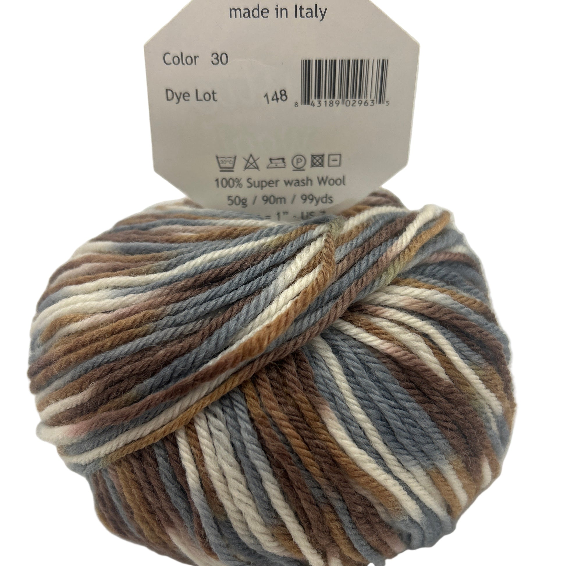 Multicolored skein of yarn with a label indicating 'made in Italy' on a white background.