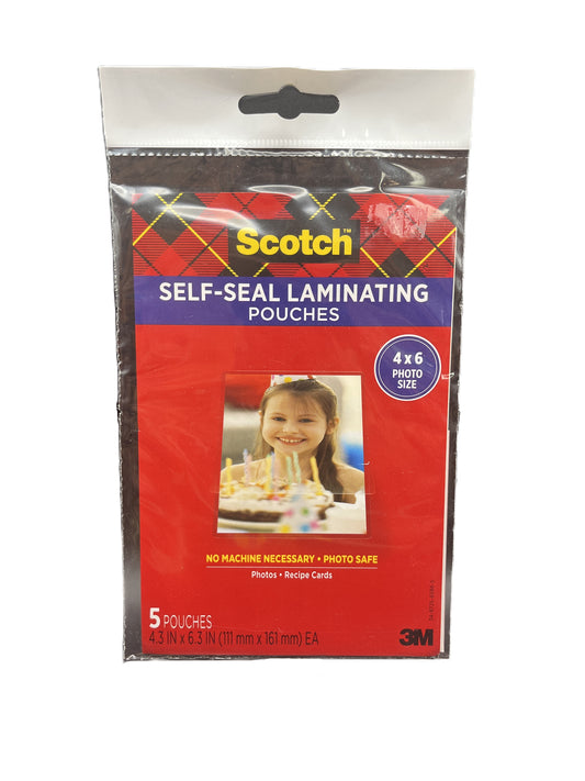 Pack of Scotch self-seal laminating pouches with a child's photo on the packaging.