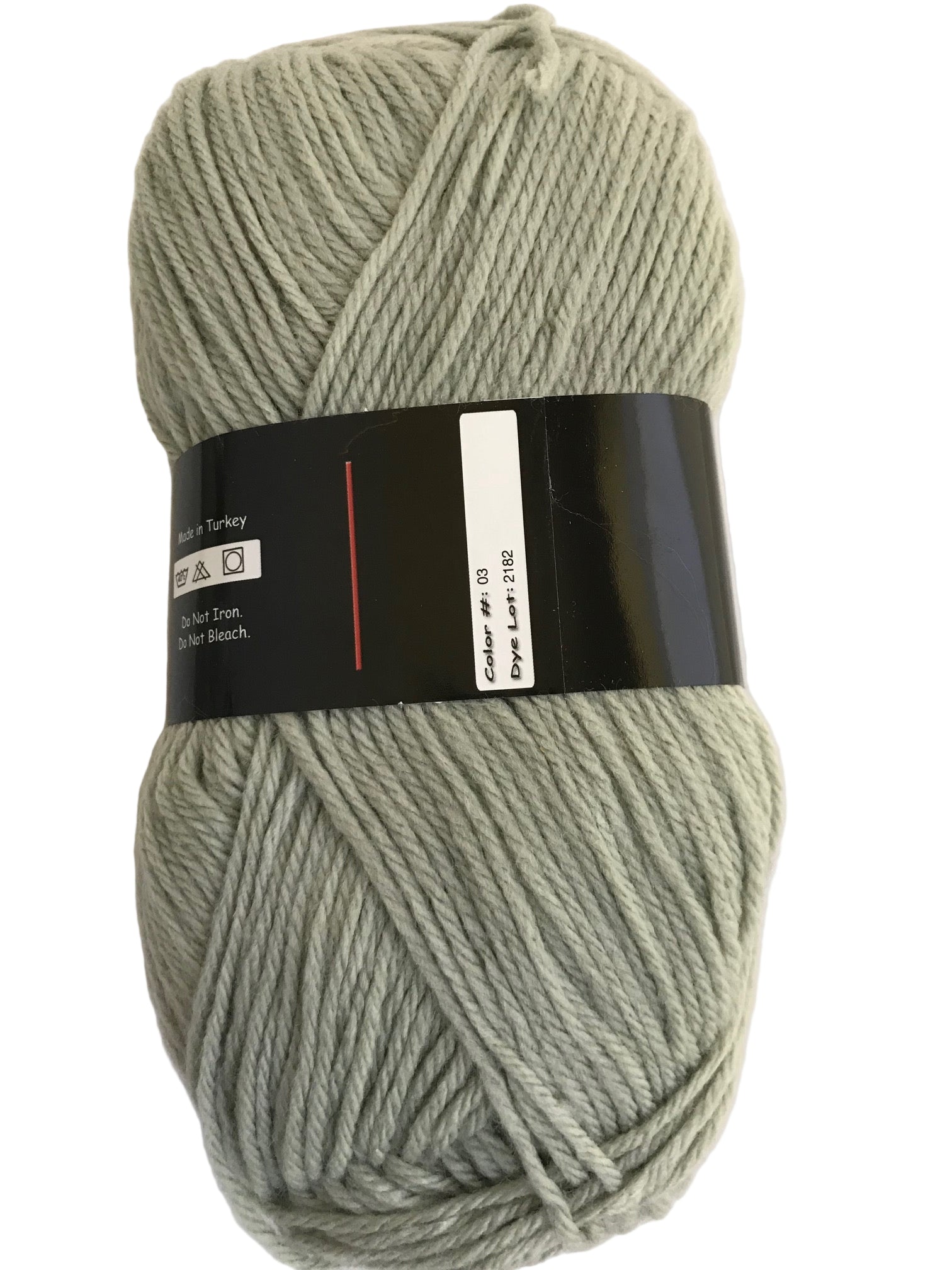 Ball of gray yarn with a label on a white background