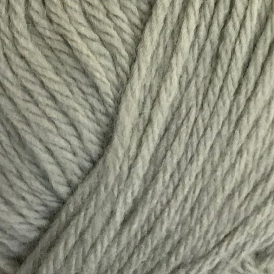 Close-up of gray yarn with a focus on texture