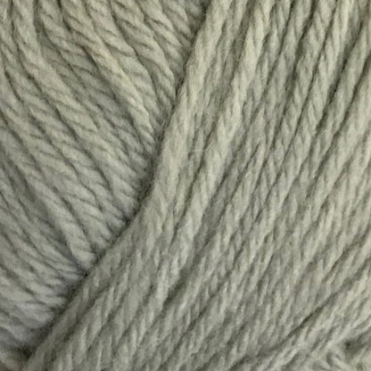 Close-up of gray yarn with a focus on texture