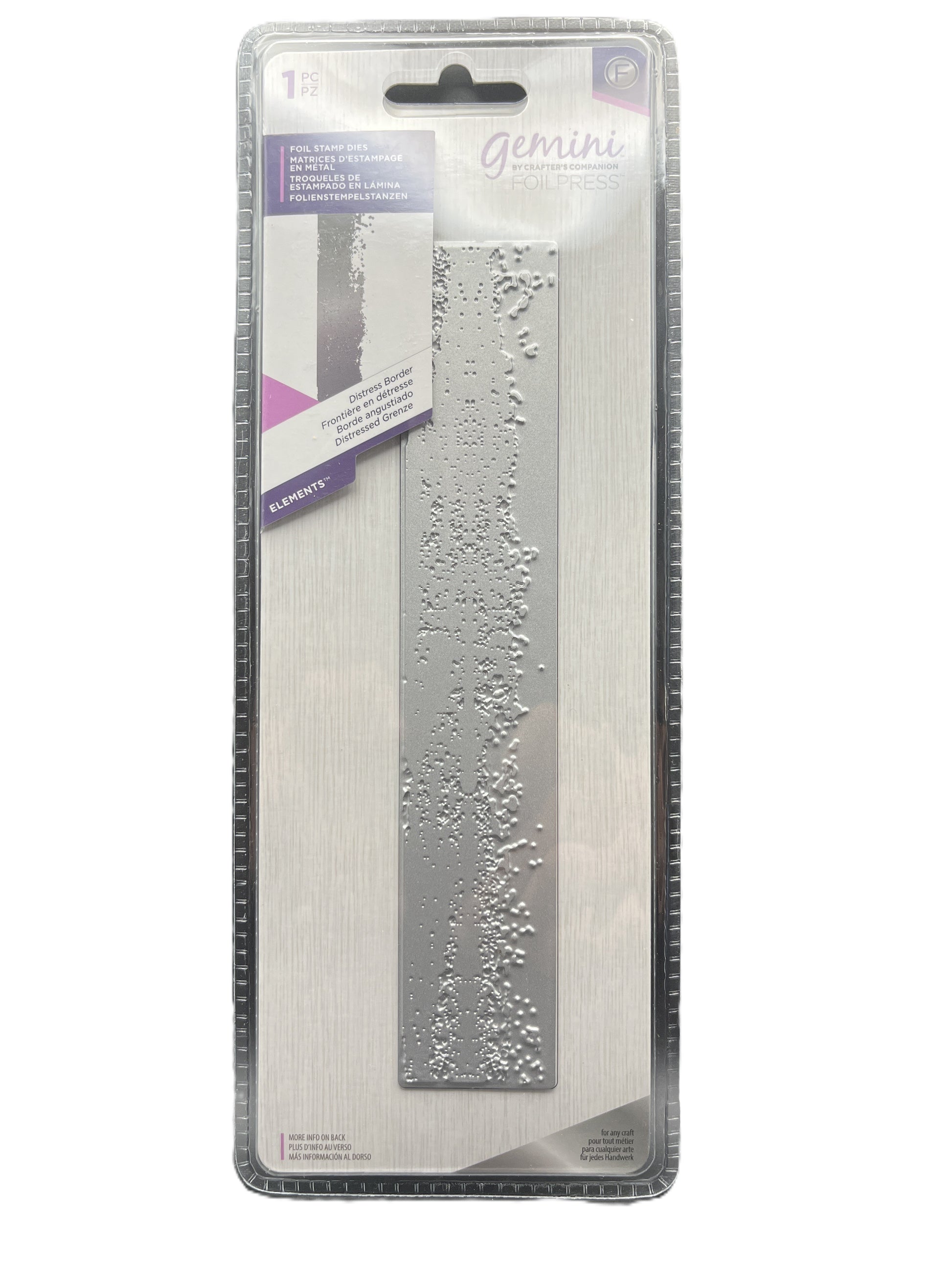 Metal die cut with textured design in packaging on a white background