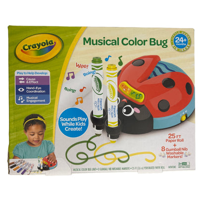 Crayola Musical Color Bug toy packaging on a gray surface