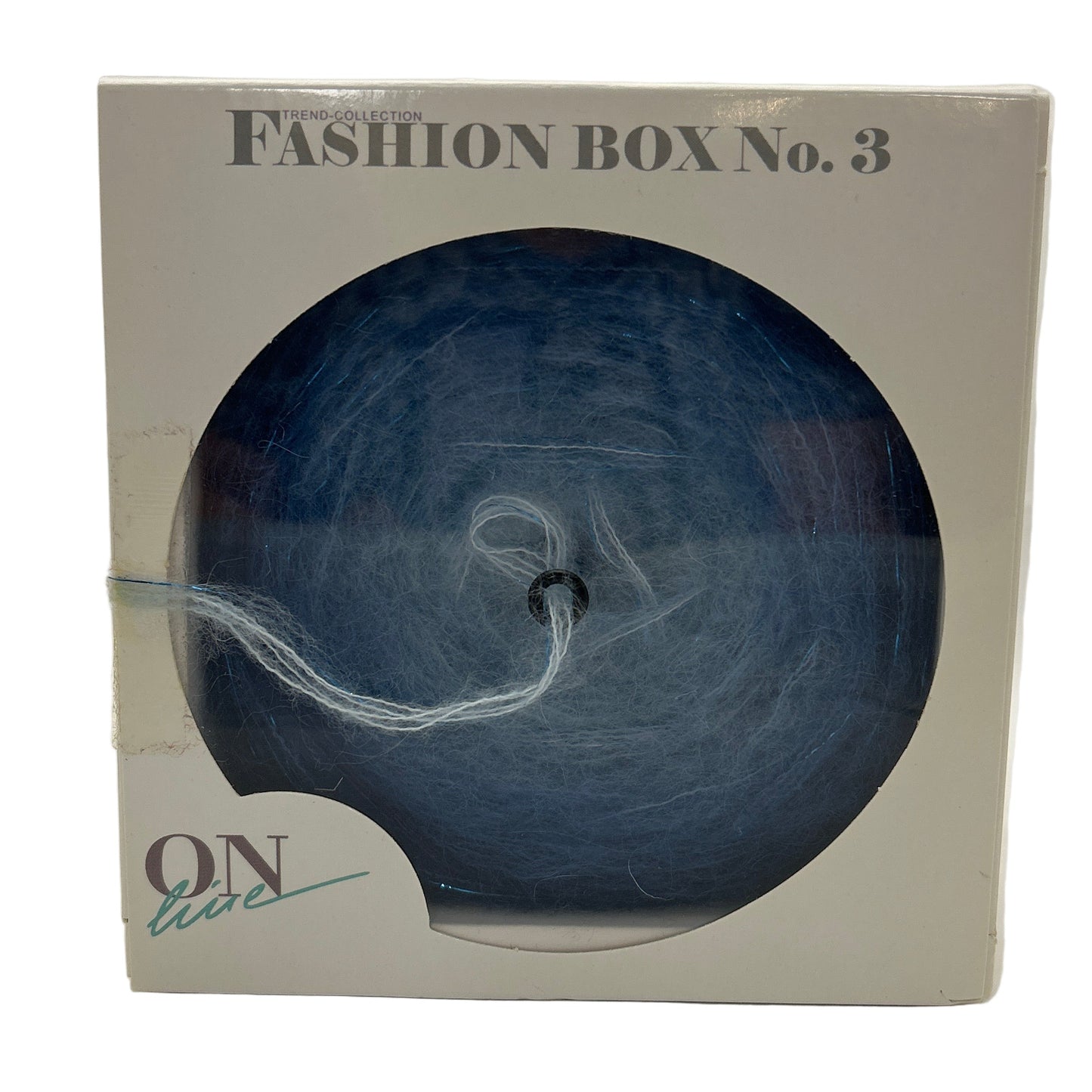 Packaged product with 'Fashion Box No. 3' and 'ON' branding on a white background