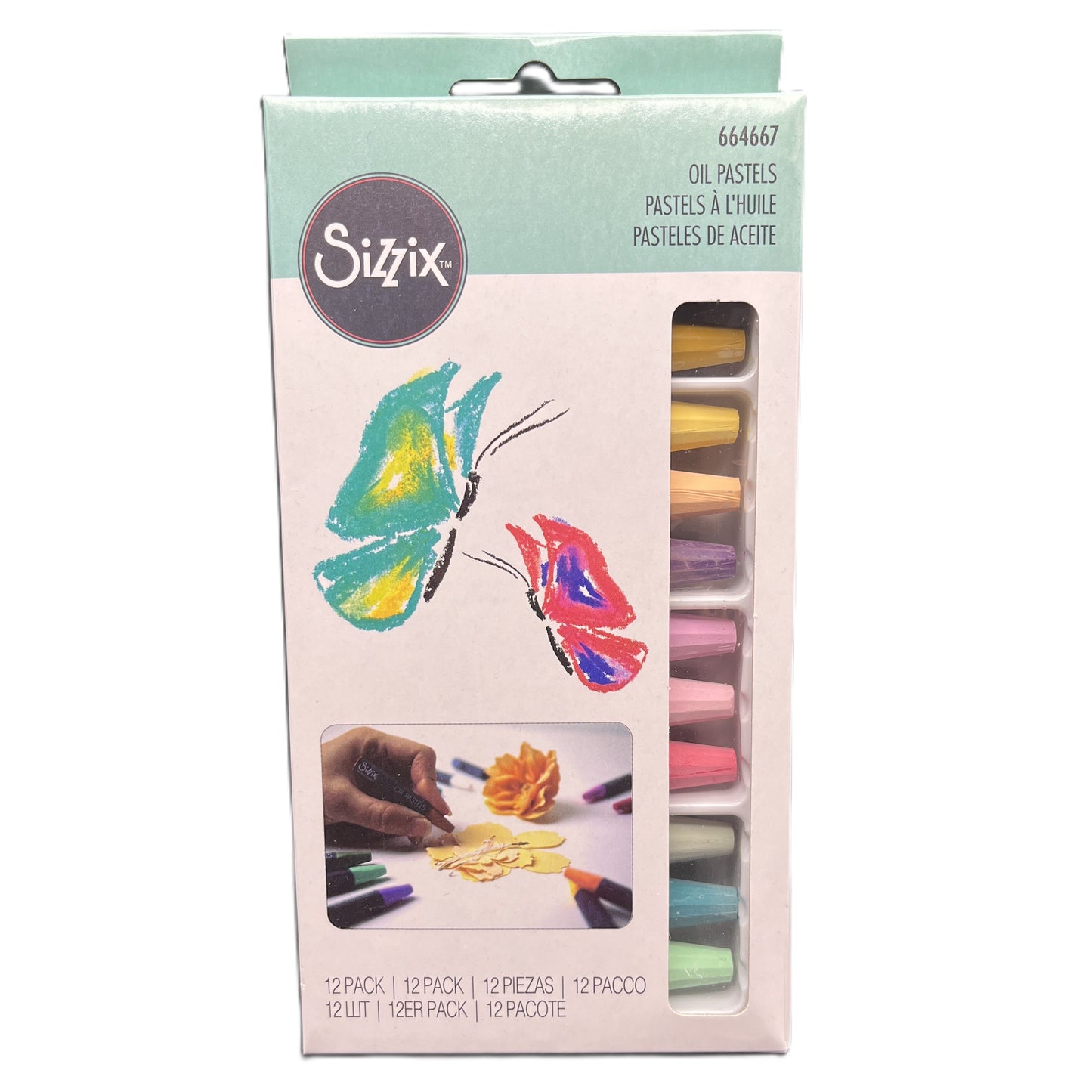 Sizzix oil pastels packaging with a butterfly illustration on a white background