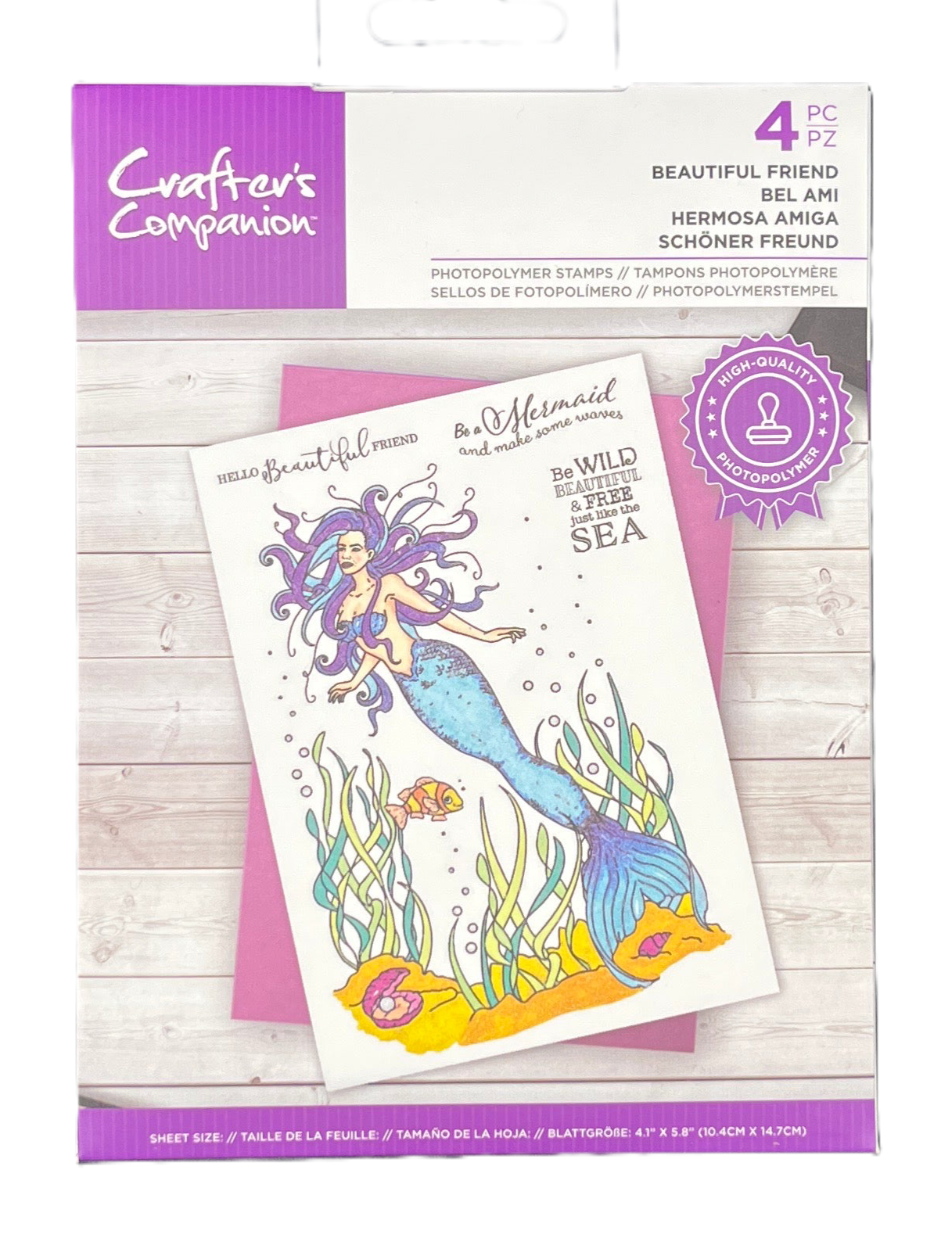 Mermaid-themed stamp set by Crafter's Companion on a wooden surface