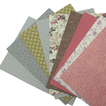 Collection of patterned paper sheets on a white background